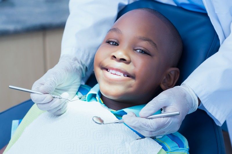 Smiling boy at a dental checkup